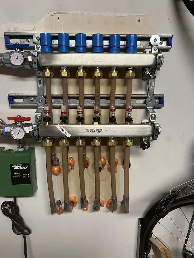 Plumber performing Gas Line Installation at a residential property in Tisbury